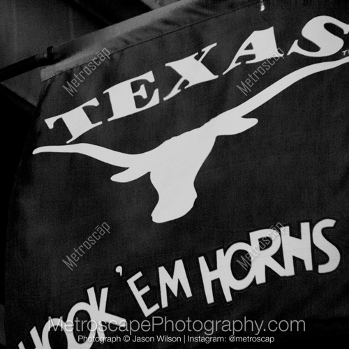 A Hook Em Horns Banner on Sixth Street