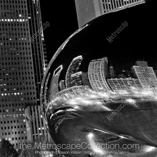 The Chicago Skyline Reflects in the Cloud Gate Sculpture in Millennium Park