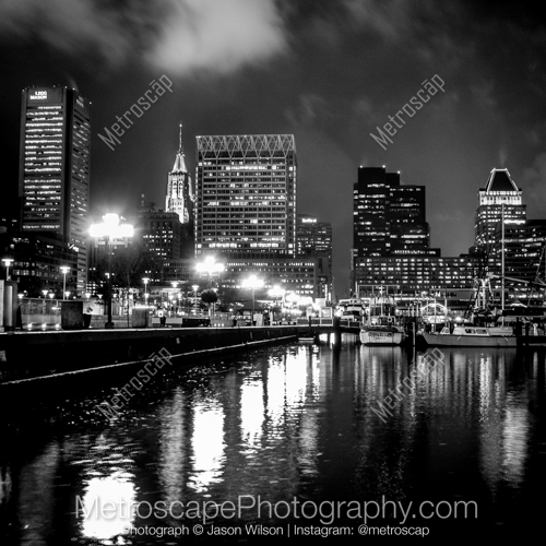 Lights along the Inner Harbor and Baltimore Skyline at Night
