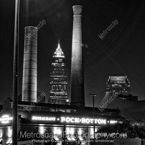 The Key Bank Building is Framed by Smoke Stacks from the Rock Bottom Brewery