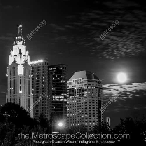 The Moonrises Behind the Columbus Skyline