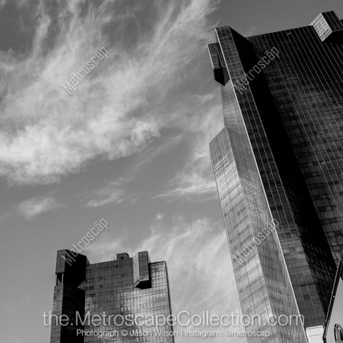 Sweeping Clouds behind the Wells Fargo Buildings