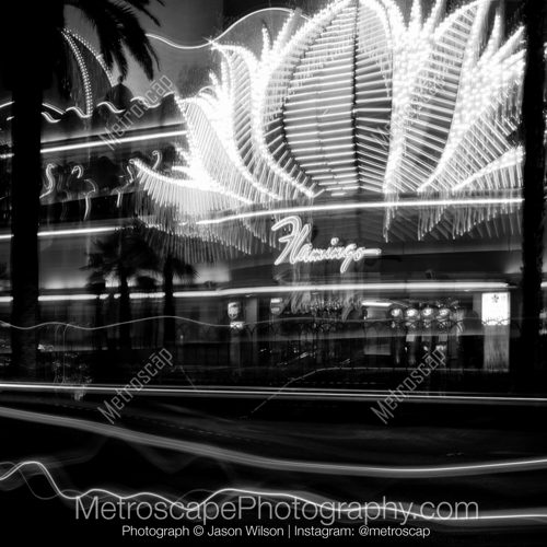 The Flamingo Hotel and Casino Sign with Traffic