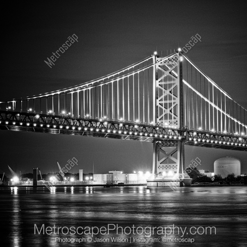 Cranes along the Delaware River under the Benjamin Franklin Bridge
