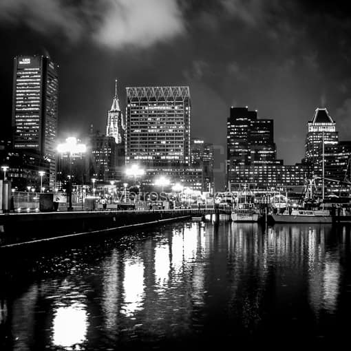 Matte Black MDF Framed Black and White Baltimore Photograph: Lights along the Inner Harbor and Baltimore Skyline at Night in a Square Matte Black MDF Frame