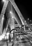 Bunker Hill Bridge Night Traffic Black and White Vertical Bunker Hill Bridge Night Traffic black and white
