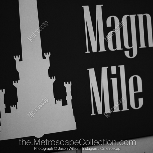 Matte Black MDF Framed Black and White Chicago Photograph: The Magnificent Mile Sign in the Red Line Terminal in a Square Matte Black MDF Frame