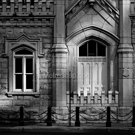 Matte Black MDF Framed Black and White Chicago Photograph: A Side Door on the Old Chicago Water Tower in a Square Matte Black MDF Frame