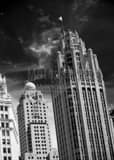 Wind Whipped Us Flag Atop Tribune Building Black and White Vertical Wind Whipped Us Flag Atop Tribune Building black and white