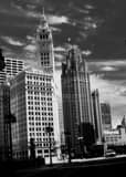 Wrigley Tribune Buildings Whispy Sky Black and White Vertical Wrigley Tribune Buildings Whispy Sky black and white