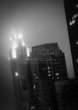 Fog Engulfs Top Leveque Tower Black and White Vertical Fog Engulfs Top Leveque Tower black and white