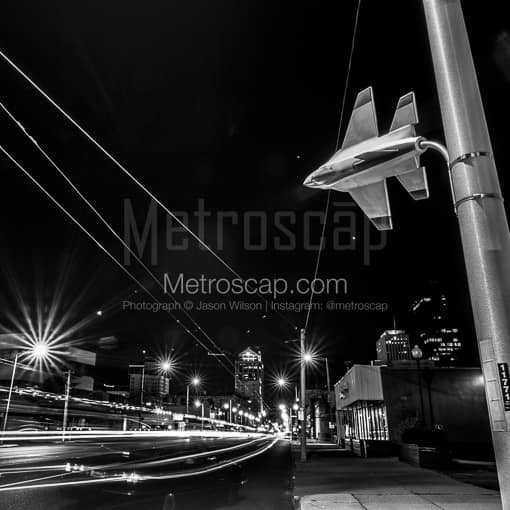 Matte Black MDF Framed Black and White Dayton Photograph: A Fighter Jet Street Lamp in Downtown Dayton in a Square Matte Black MDF Frame