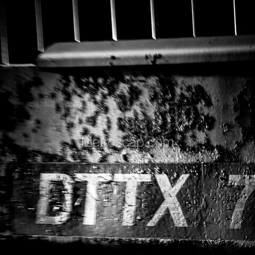 Matte Black MDF Framed Black and White Detroit Photograph: A Double Stacker Train Car in a Square Matte Black MDF Frame