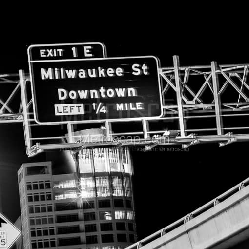 Matte Black MDF Framed Black and White Milwaukee Photograph: Milwaukee St Downtown Highway Sign in a Square Matte Black MDF Frame