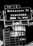 Milwaukee St Downtown Highway Sign Black and White Vertical Milwaukee St Downtown Highway Sign black and white