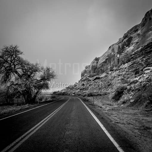 Matte Black MDF Framed Black and White Monument Valley Photograph: Route 163 along the Montezuma Creek in a Square Matte Black MDF Frame