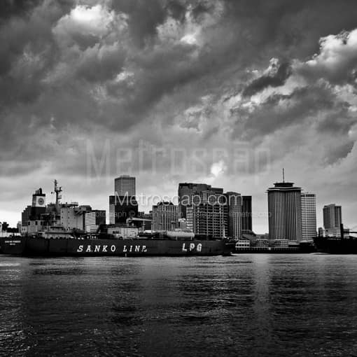 Matte Black MDF Framed Black and White New Orleans Photograph: The New Orleans Skyline and Mississippi River Barge in a Square Matte Black MDF Frame
