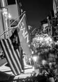 Saints Flag Above Bourbon Street Black and White Vertical Saints Flag Above Bourbon Street black and white