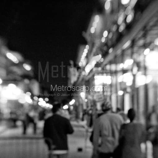 Matte Black MDF Framed Black and White New Orleans Photograph: People Stroll along Bourbon Street in a Square Matte Black MDF Frame