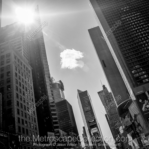 Matte Black MDF Framed Black and White New York City Photograph: A Single Cloud Floats Above Times Square in a Square Matte Black MDF Frame