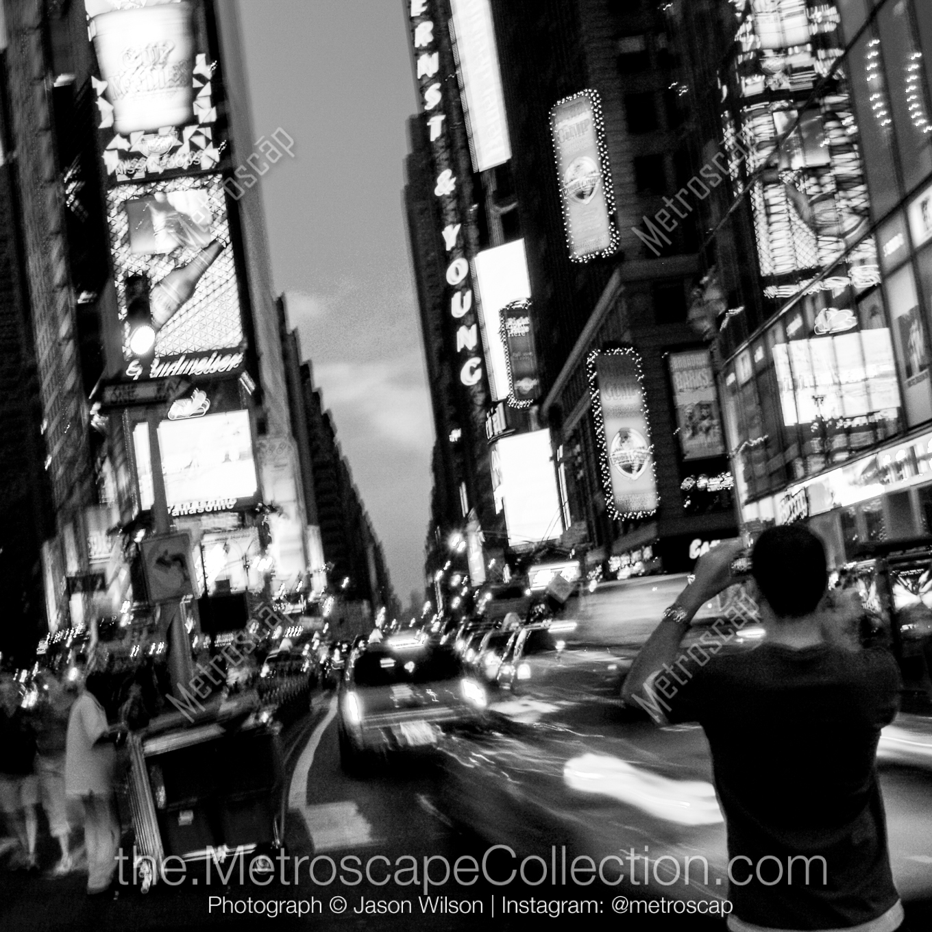 A Photographer Trying to Capture Times Square black and white Pictures A Photographer Trying to Capture Times Square black and white Pictures square crop