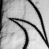 Stitches On Worlds Largest Cowboy Boots Black and White Square Stitches On Worlds Largest Cowboy Boots black and white