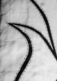 Stitches On Worlds Largest Cowboy Boots Black and White Vertical Stitches On Worlds Largest Cowboy Boots black and white