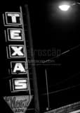 Texas Neon Advertising Sign Black and White Vertical Texas Neon Advertising Sign black and white