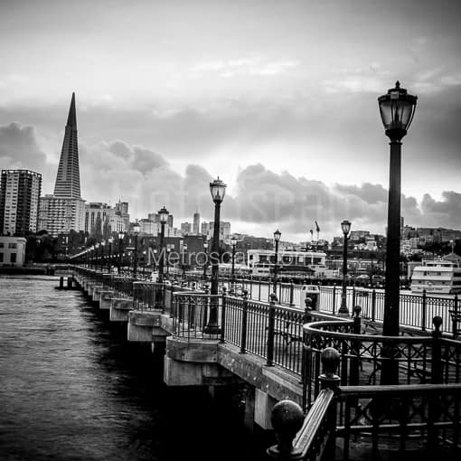 Matte Black MDF Framed Black and White San Francisco Photograph: Gaslights Line Pier 7 in San Francisco in a Square Matte Black MDF Frame