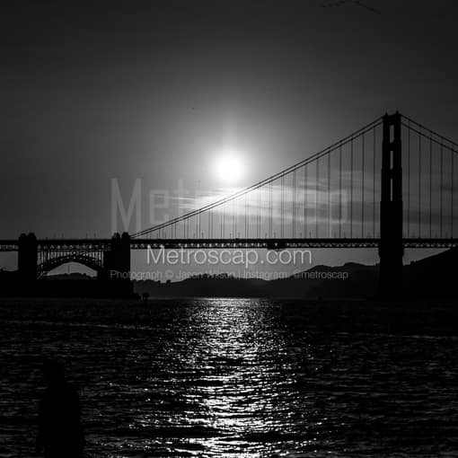 Matte Black MDF Framed Black and White San Francisco Photograph: The Setting Sun Silhouettes the Golden Gate Bridge in a Square Matte Black MDF Frame