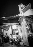 Vinnie Van Go Go Pizzeria Black and White Vertical Vinnie Van Go Go Pizzeria black and white