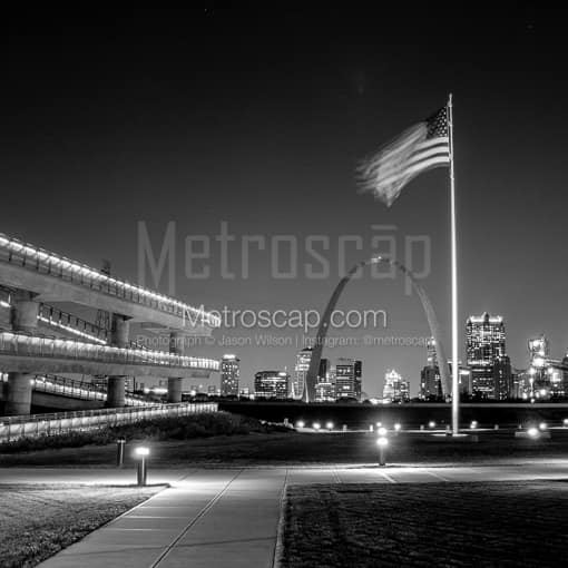 Matte Black MDF Framed Black and White St Louis Photograph: The American Flag Above the Gateway Arch in a Square Matte Black MDF Frame