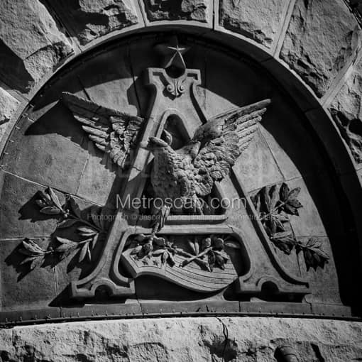 Matte Black MDF Framed Black and White St Louis Photograph: The Anheuser Busch Logo in Stone in a Square Matte Black MDF Frame