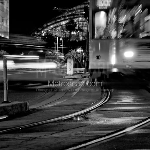 Matte Black MDF Framed Black and White Tampa Photograph: A Taxi and Street Car Converge on Channelside in a Square Matte Black MDF Frame