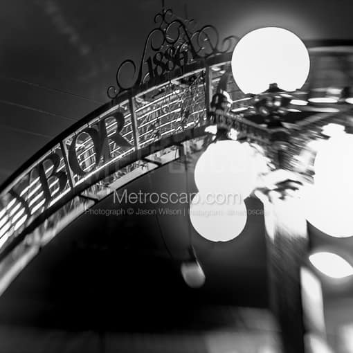 Matte Black MDF Framed Black and White Tampa Photograph: Ybor City Arch in a Square Matte Black MDF Frame