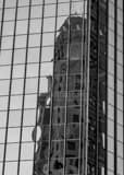 Glass City Skyscraper Reflection Black and White Vertical Glass City Skyscraper Reflection black and white