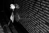 Rose And Flag On Vietnam Wall Black and White Horizontal Rose And Flag On Vietnam Wall black and white