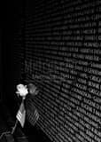 Rose And Flag On Vietnam Wall Black and White Vertical Rose And Flag On Vietnam Wall black and white